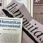 Paper documents from the Humanitas International organization, founded by Joan Baez