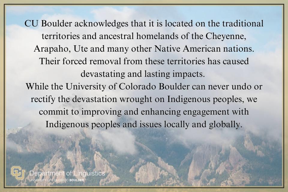 Land Acknowledgement text with mountains in background