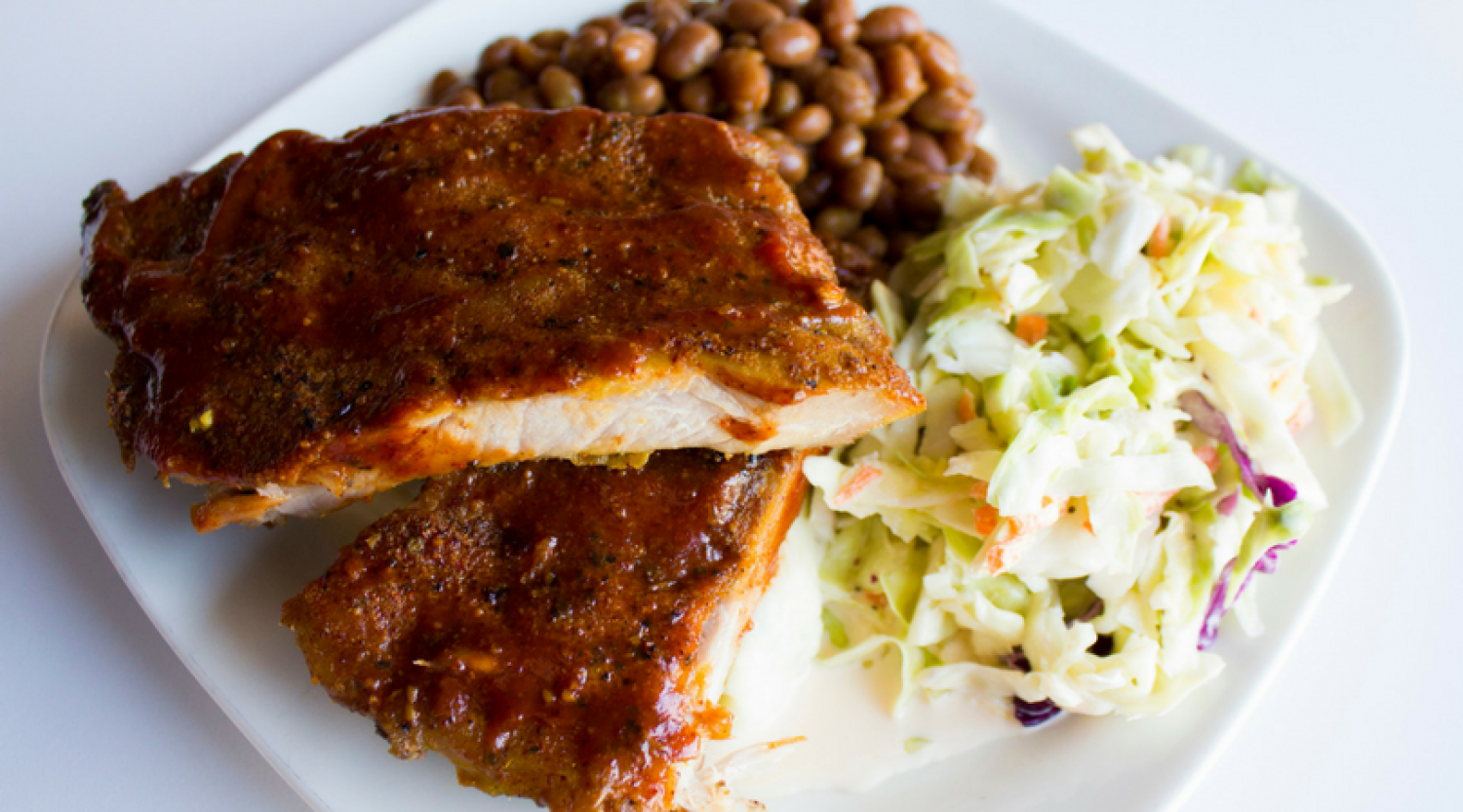 Grilled pork ribs, coleslaw, baked beans