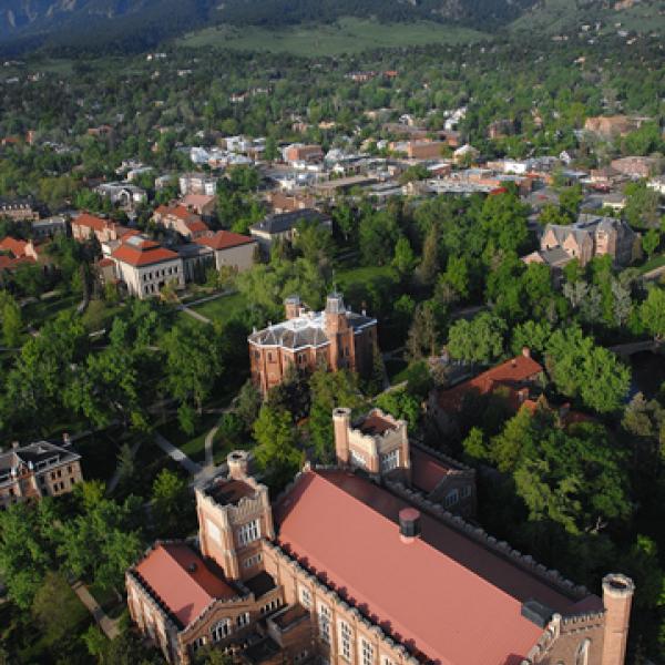 An aerial view of Macky Auditorium, Old Main and older end of the Boulder Campus with the Flatirons in background. (Photo by Casey A. Cass/University of Colorado)