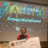 nausica Arnoult showing award.