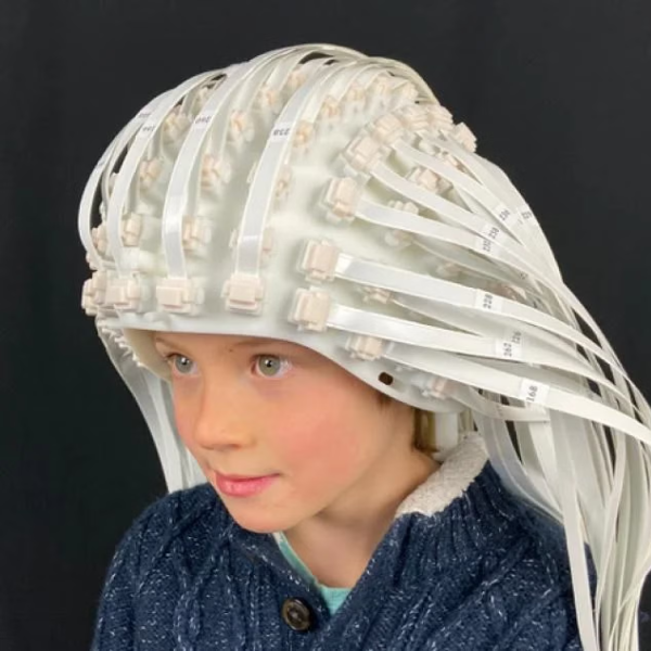 Child wearing OPM sensor helmet manufactured by FieldLine Inc.