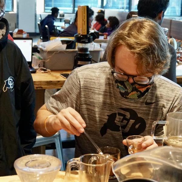 Students prepare to taste coffee