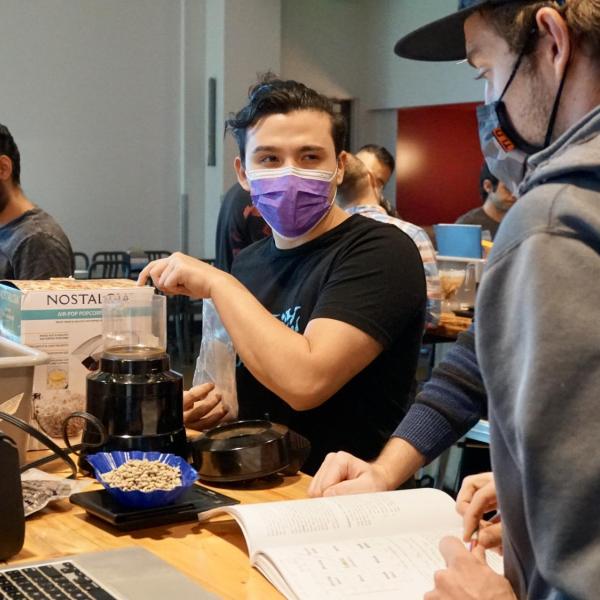 Students prepare to roast their beans
