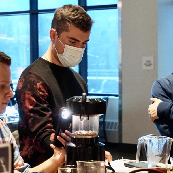 Students roast their coffee beans