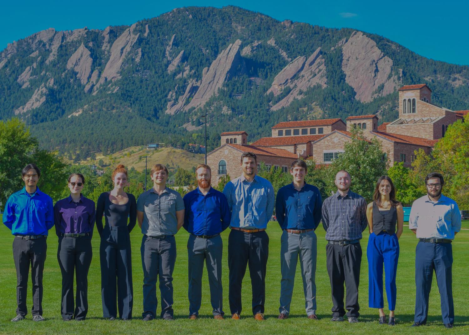 students posing for group photo outside