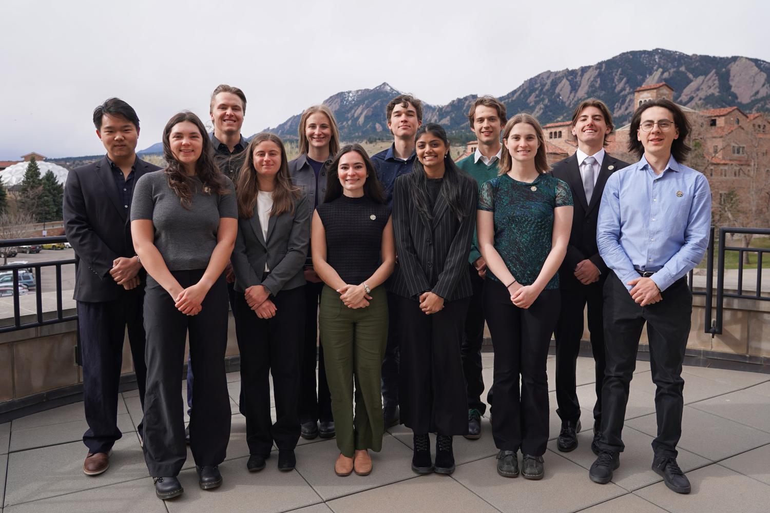 students posing for group photo outside