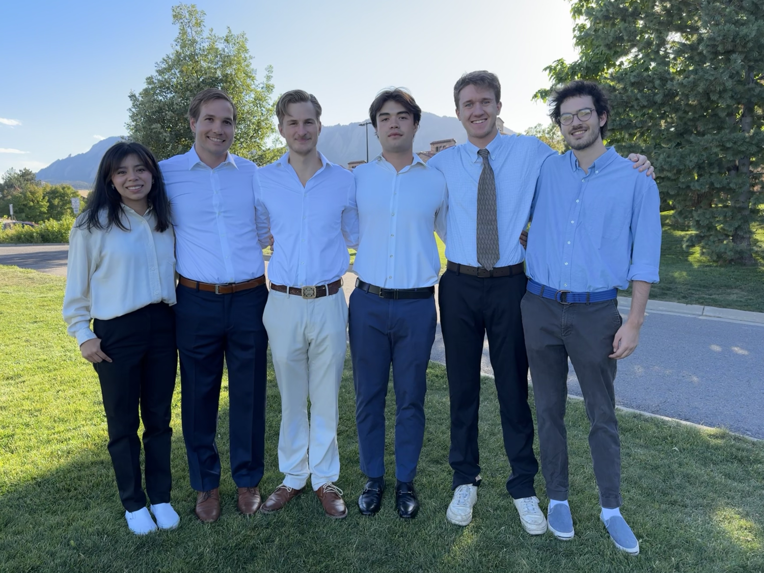 students posing for group photo outside