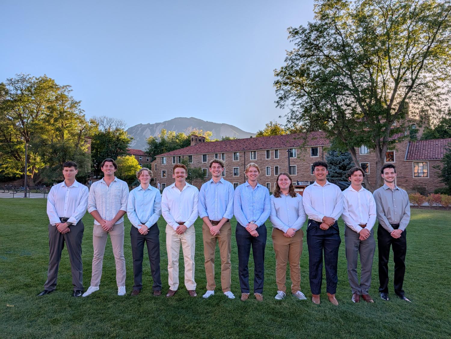 students posing for group photo outside