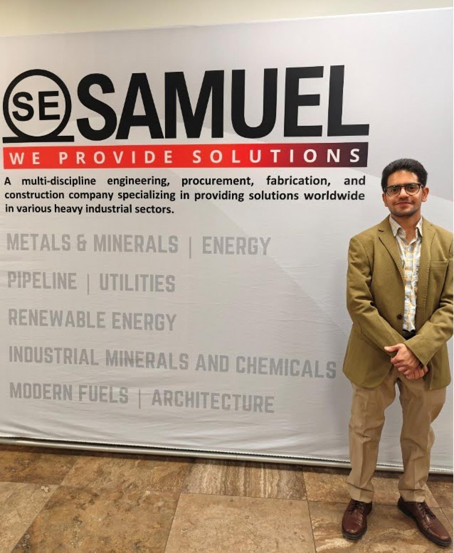 student posing for picture at internship