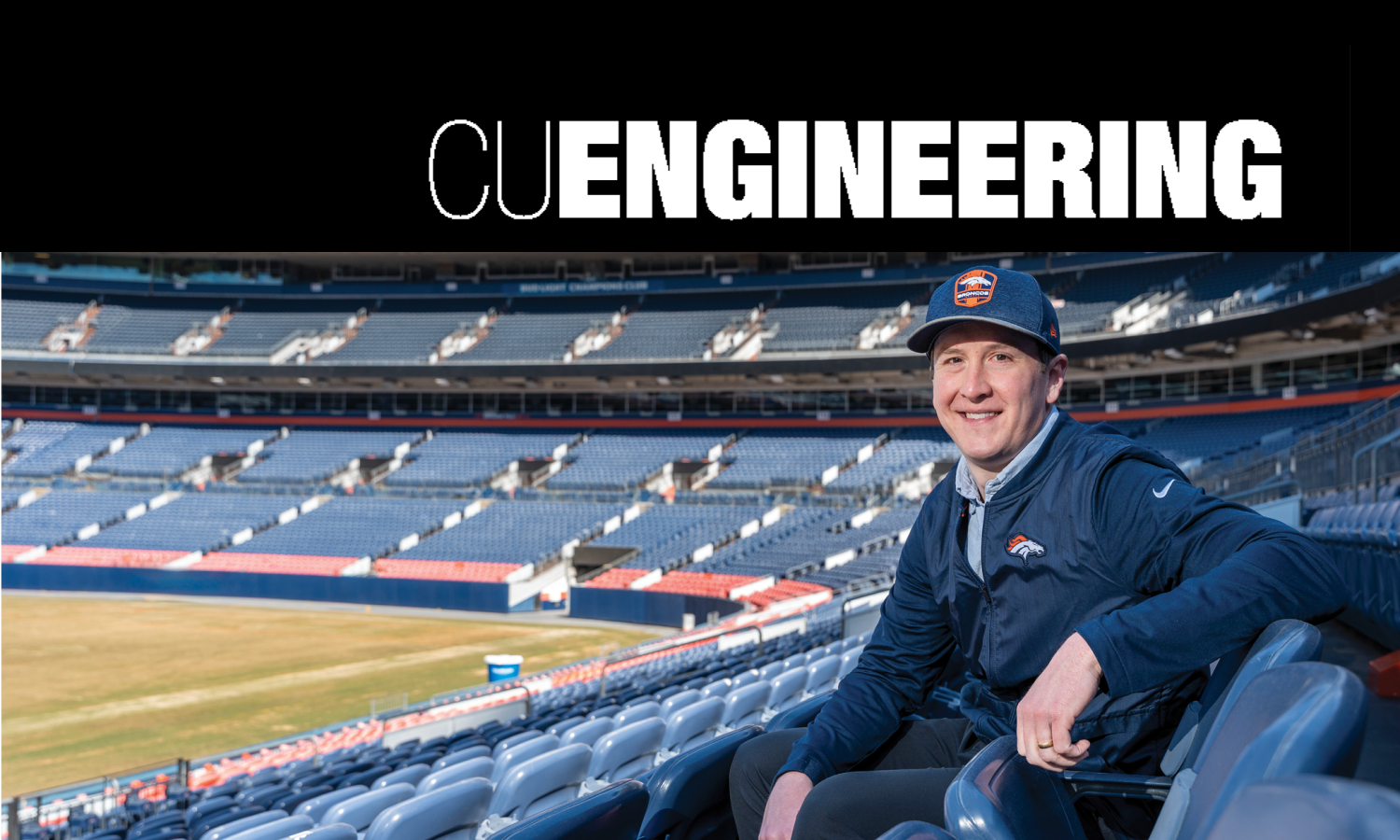 photo of man sitting in Broncos stadium with a masthead that says "CU Engineering"