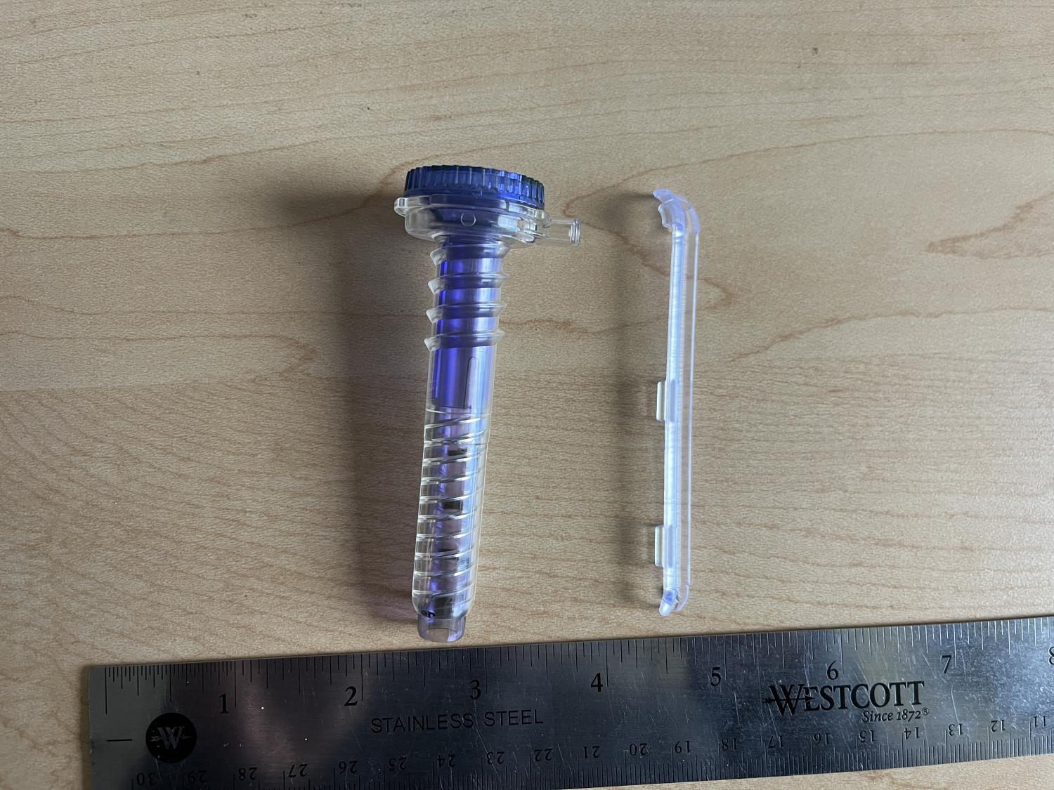 Close-up showing the slotted cannula next to a standard cannula