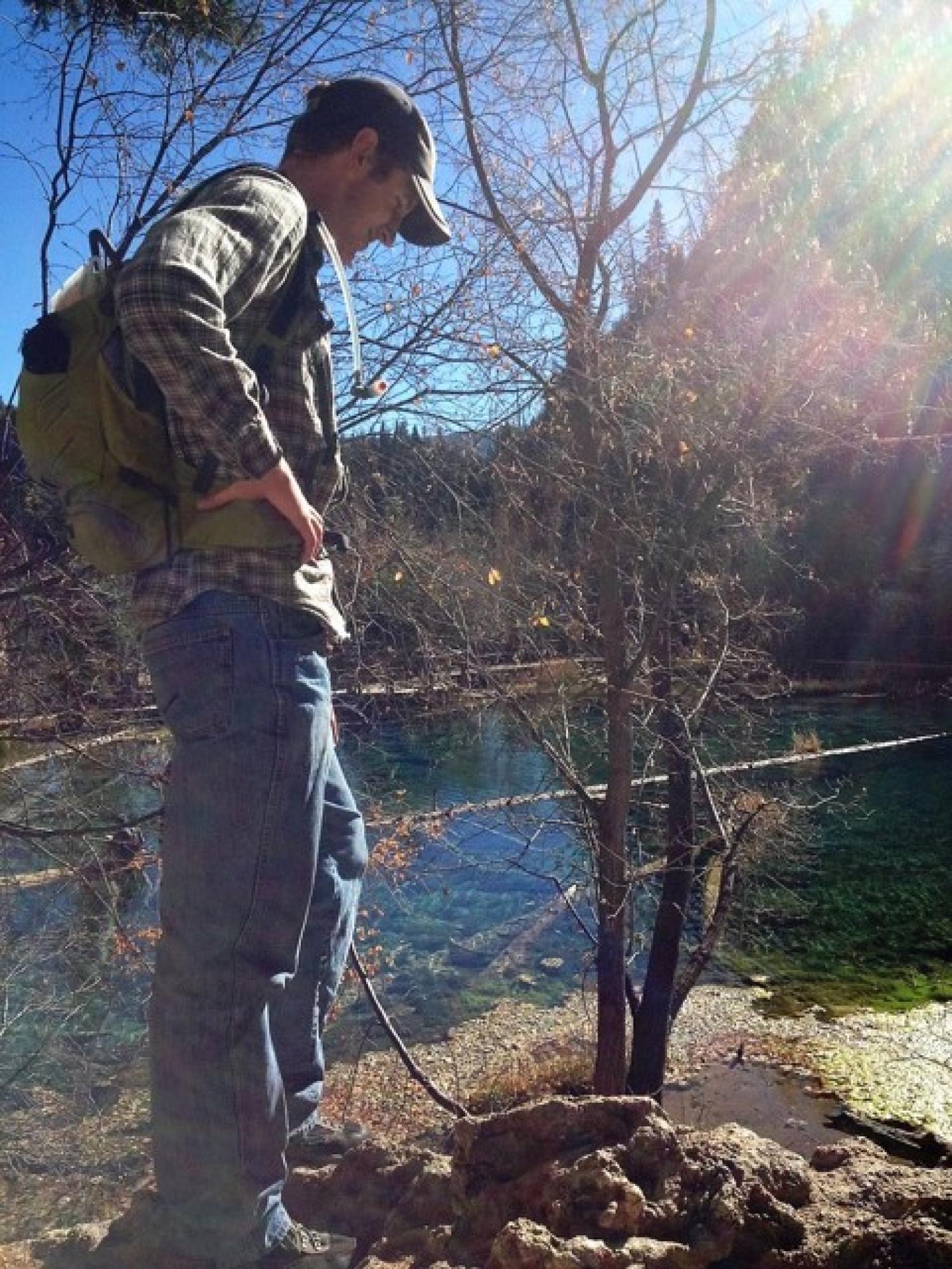 Tyler Sharpe by a tree.