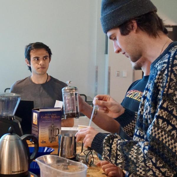 Students get ready to taste their coffee