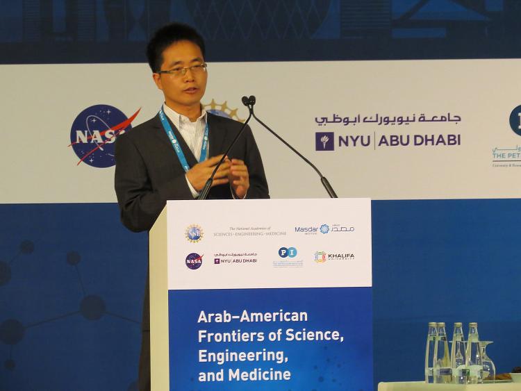 Ronggui Yang speaking at the symposium