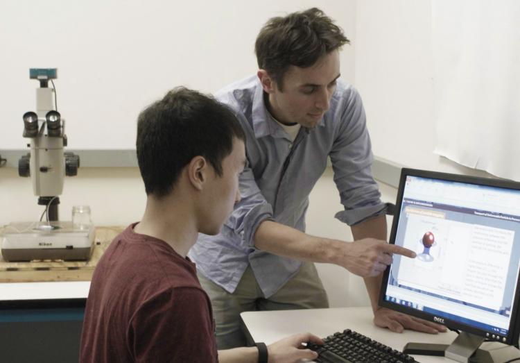 Franck Vernerey with a student.