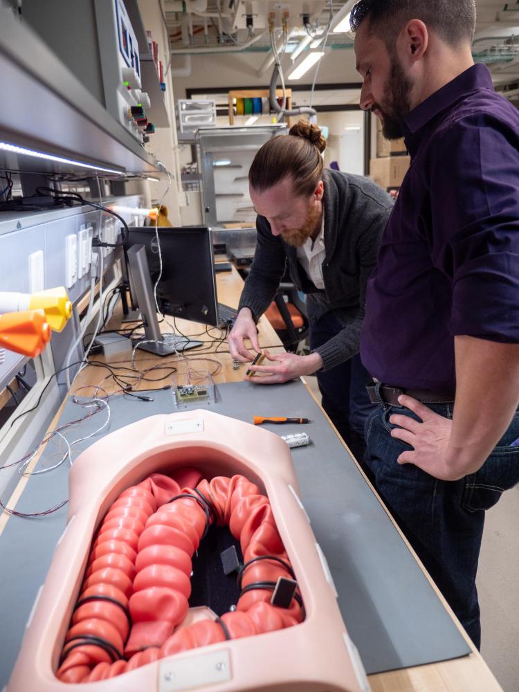 Micah Prendergast works on Endoculus robotic capsule endoscope