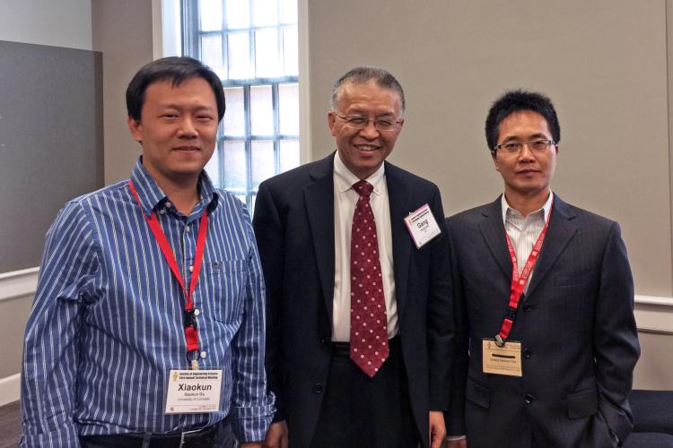 Xiaokun Gu (left) with CU Boulder ME professor Ronggui Yang (his thesis advisor, right) and professor Gang Chen of MIT (Yang's thesis adviser, middle) at an engineering conference in November 2016.