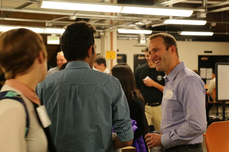 Alumnus Scott Washburn with students.