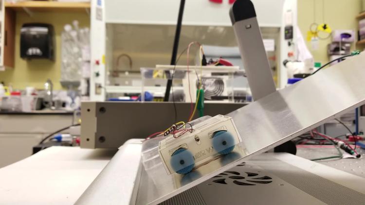 Miniature tank tread robot ascending an incline
