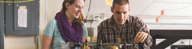 Two students working in the Precision Laser Diagnostics Lab.