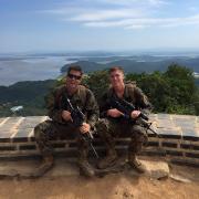 Richard Barnitz and a second soldier in Marine Corps uniforms.