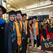 Faculty and students line up for the spring 2023 graduation ceremony