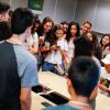 Roaring Fork High School students excitedly crowd around to wait for judging of their spaghetti bridges