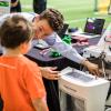 Teaching child at Engineering Projects Expo 2019
