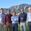 Victor Bright with his researchers in front of the Boulder Flatiron mountains.
