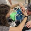 Two students working on the project.