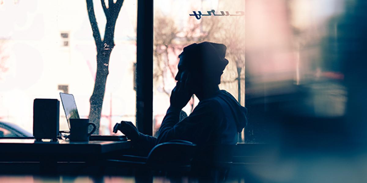 Student studying in lounge.