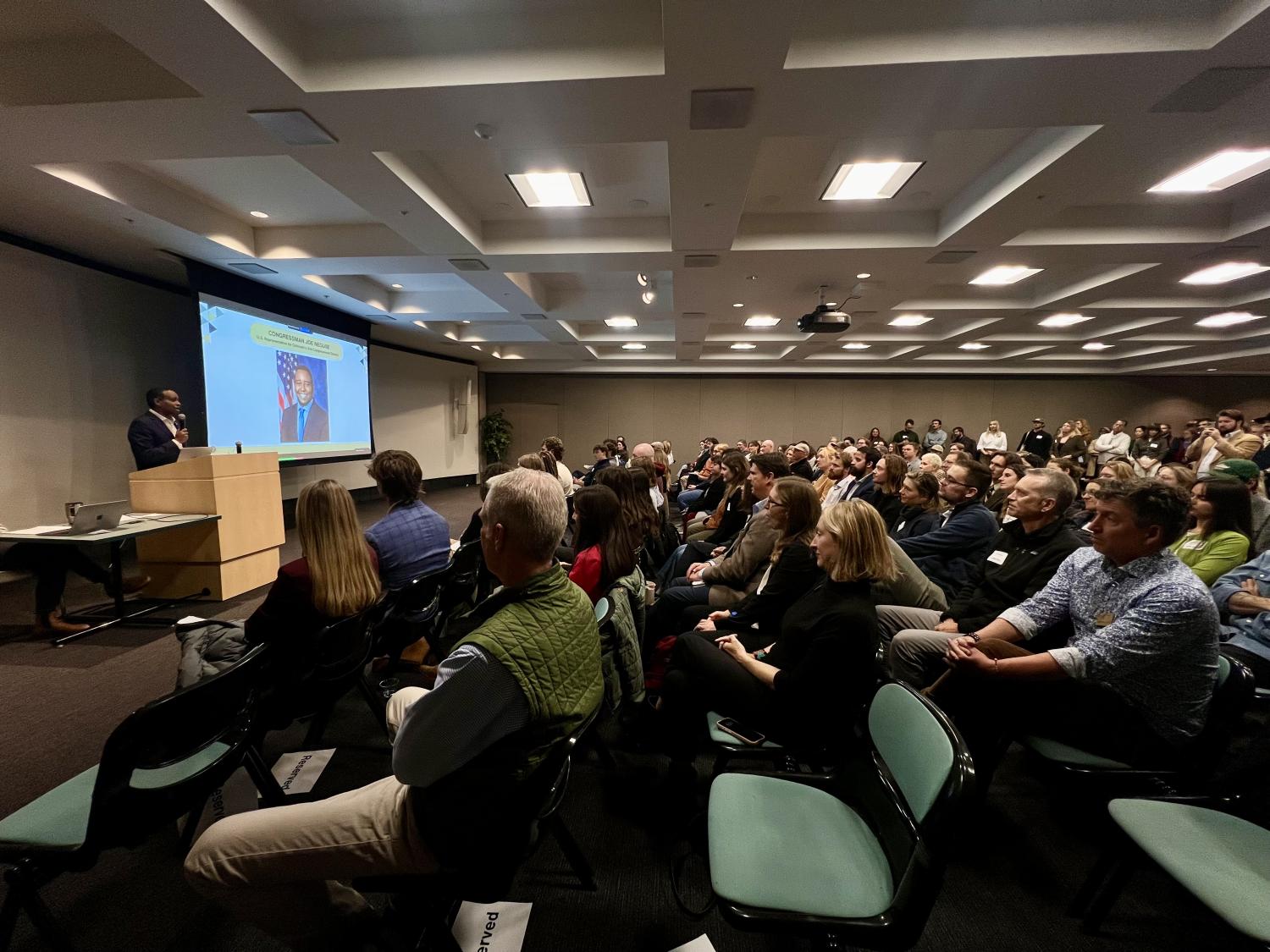 Congressman Joe Neguse speaking at the 2025 Capstone Symposium