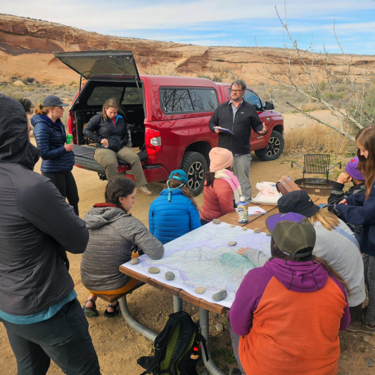Students listening to instructor in southern CO field seminar.