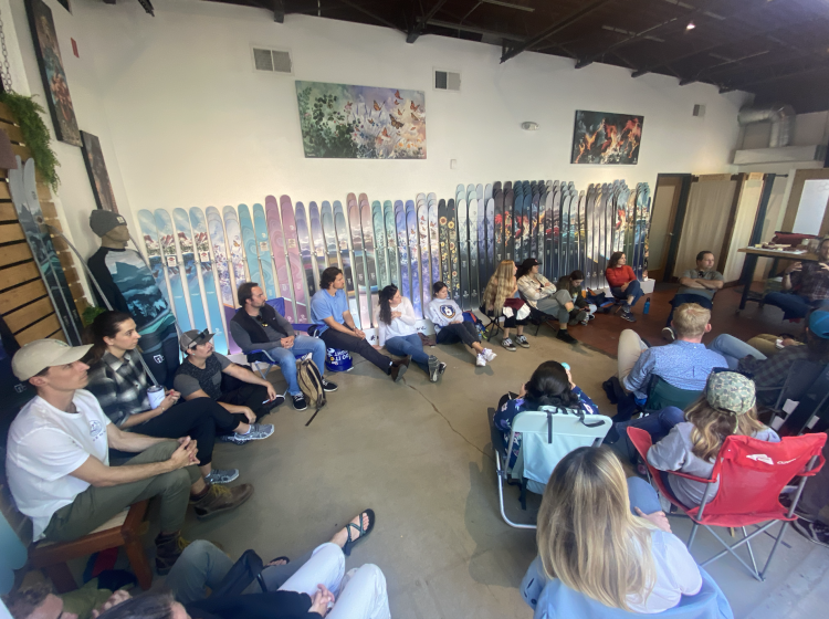 Students listening to a speaker at the Icelandic Ski Company.