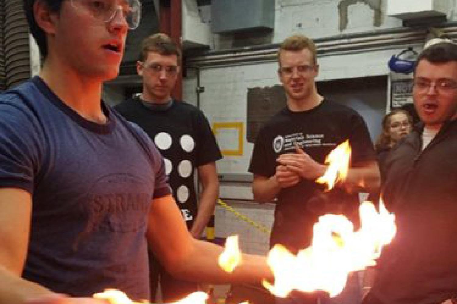 Students working with fire