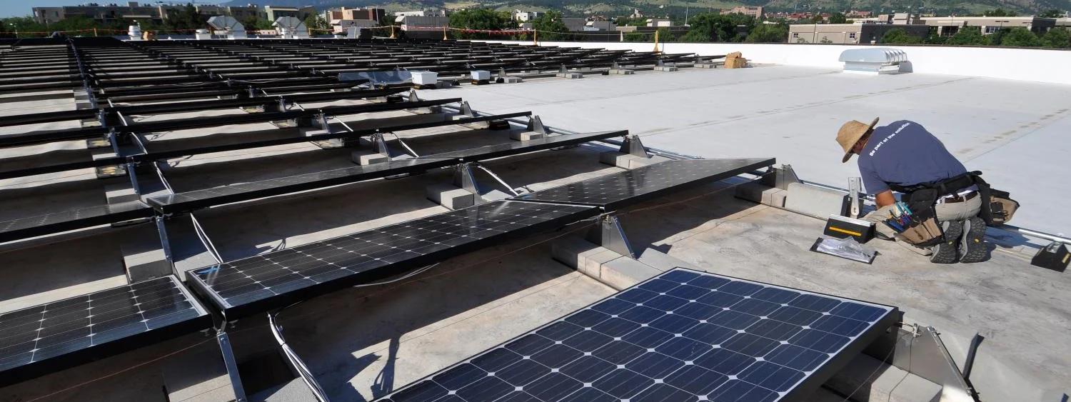 Rooftop solar panels in Boulder on a sunny day.