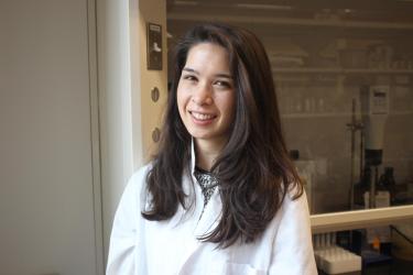 Elizabeth Hjelvik wearing white lab coat