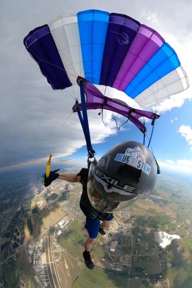 Harris skydiving over Longmont.
