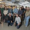 Students and faculty posing in a lab.