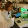 Morgan Riffe (left), a PhD candidate in Materials Science & Engineering, looks on while Meg Cooke, PhD, research associate in the BioFrontiers Institute, points to 3D printing biomaterial scaffolds that use an extrusion printer.