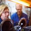 Images: Mike McGehee and Tomas Leitjens working on solar cells; a stacked illustration of how the perovskite layer (purple layer) will be laid on top of the existing silicon technology (grey-scaled layer), representing both the monolithic and mechanically stacked configurations.