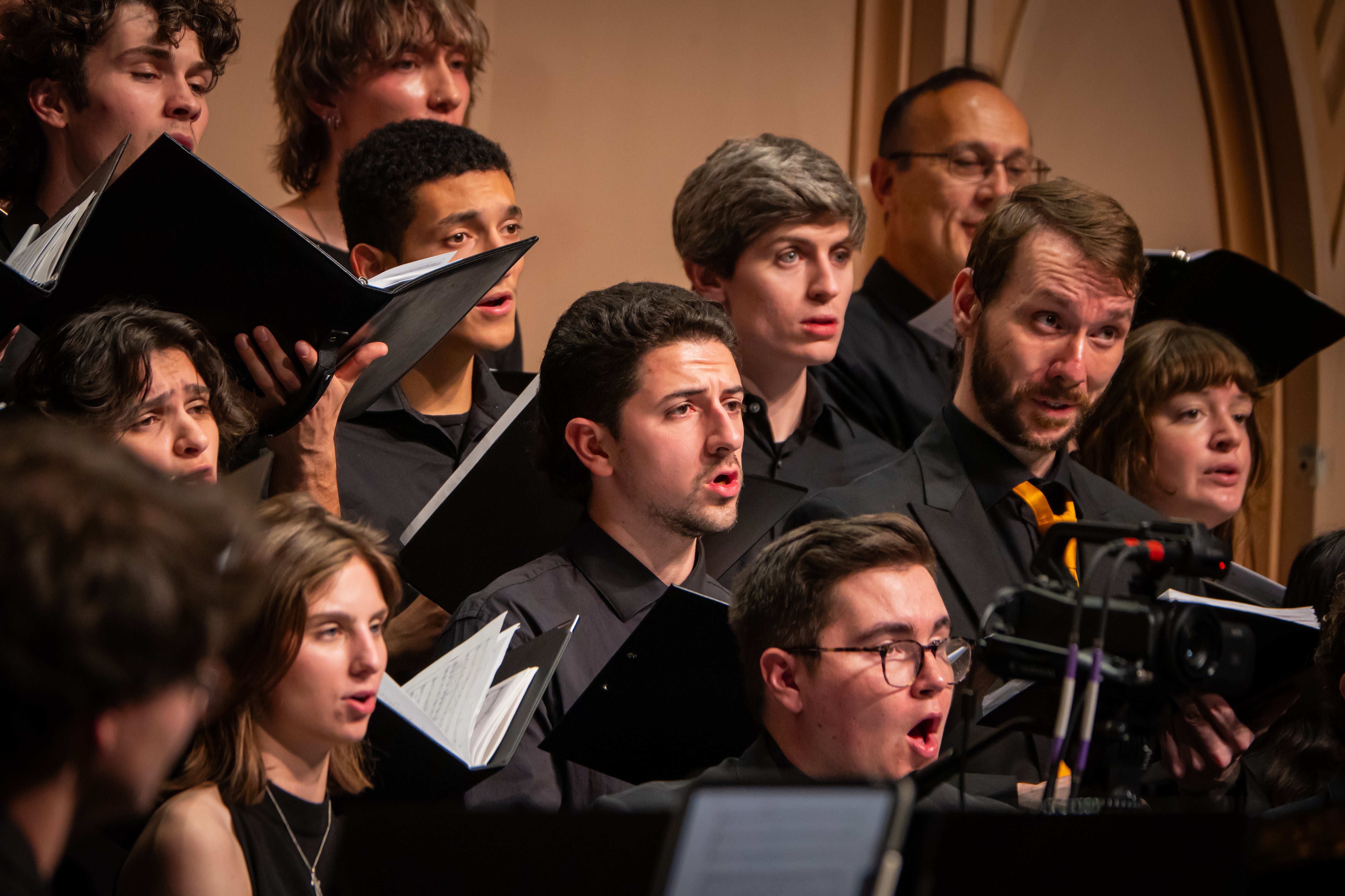 Choir on stage at Macky auditorium