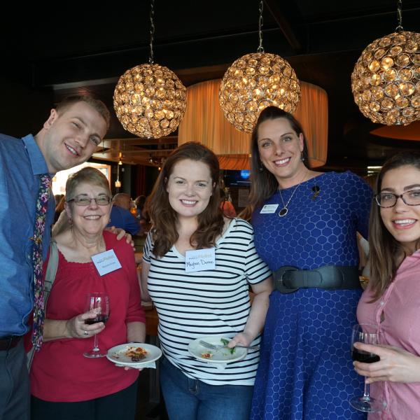 Flutists pose at the Once a Flutist alumni reception