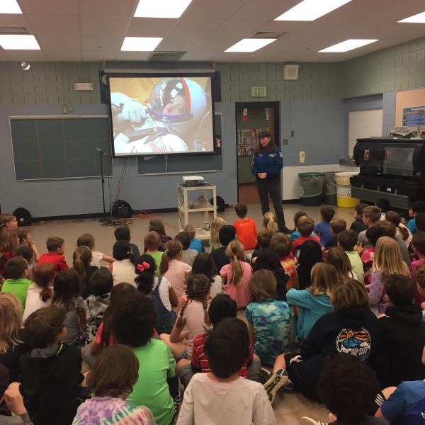 Cady Coleman gives her talk on playing flute in space