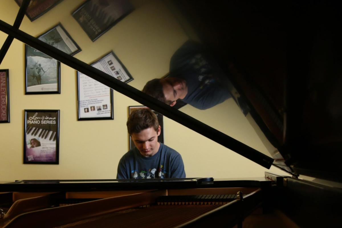 Student playing piano