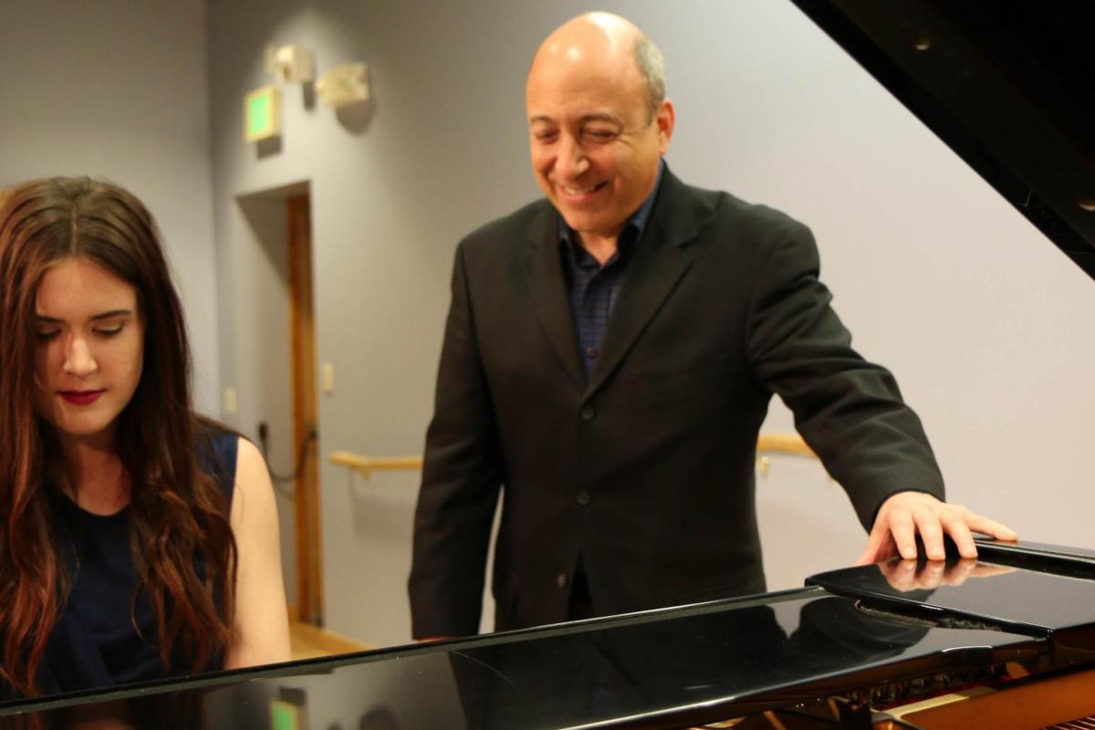 Keyboard teacher with student