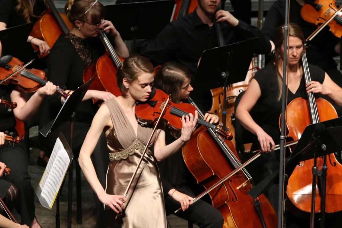 violinist performing on stage