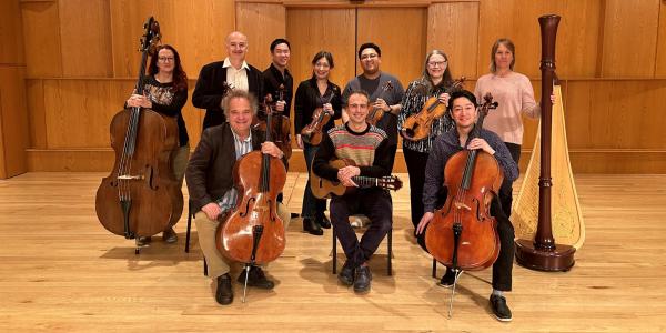 string faculty on stage in Grusin Music Hall