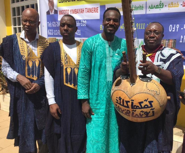 austin okigbo posing with fellow presenters in africa